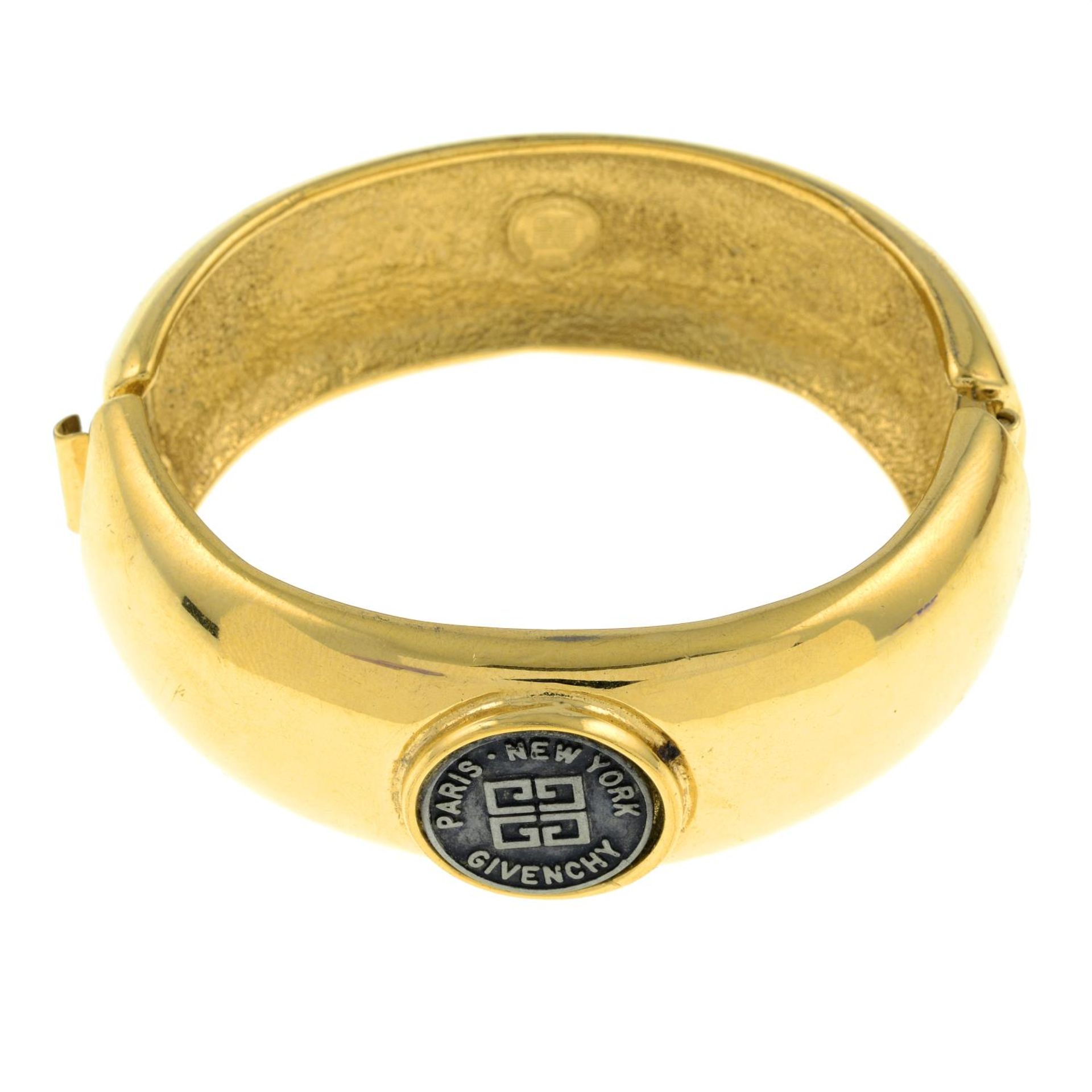 GIVENCHY - a vintage bangle with logo detail.Signed Givenchy.Inner diameter 5.5gms.