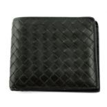 BOTTEGA VENETA - an Intrecciato leather bifold wallet.