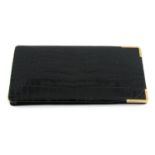 ASPREY - a black crocodile embossed phone case.