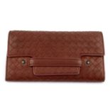 BOTTEGA VENETA - a brown Intrecciato leather wallet.