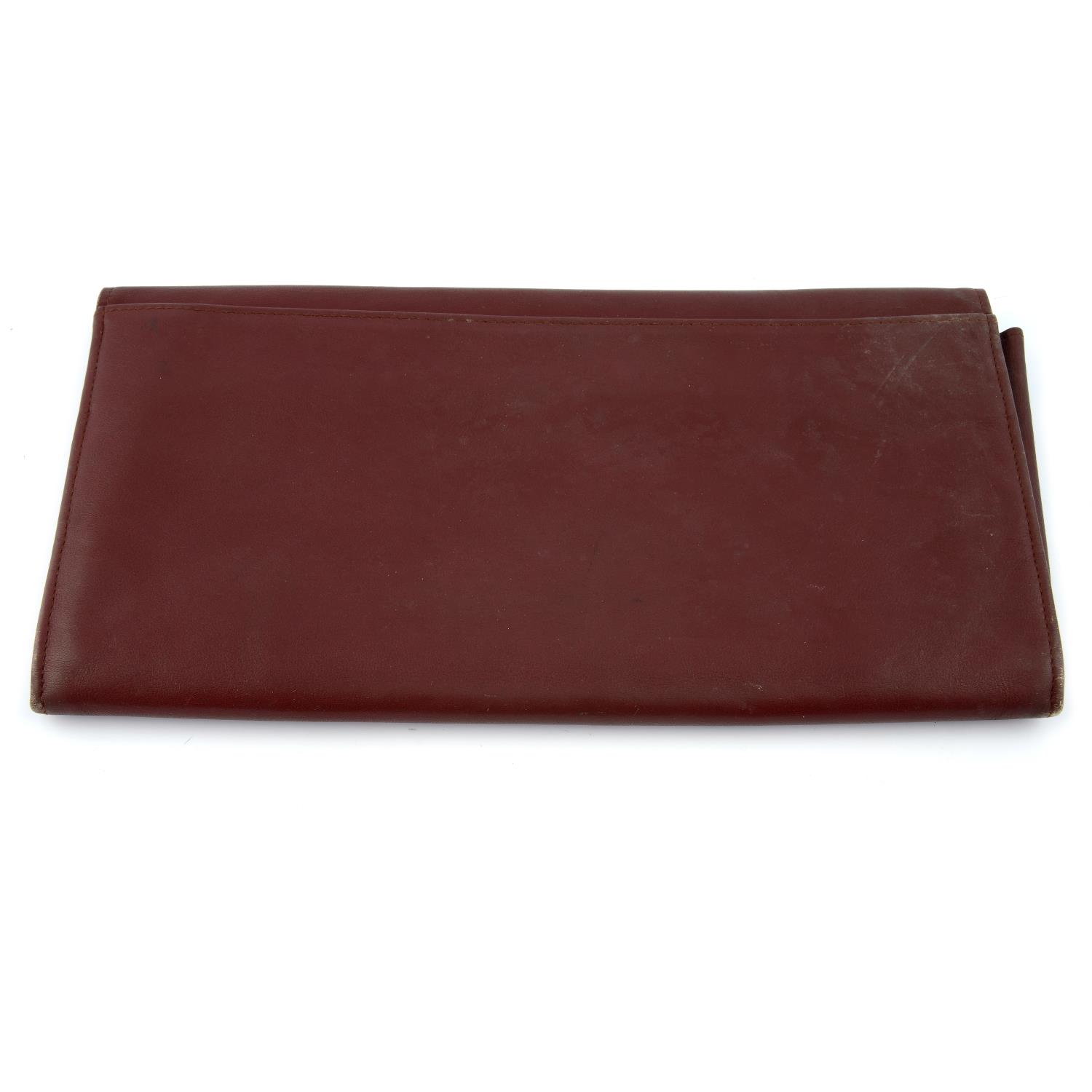 CARTIER - a Bordeaux leather travel wallet. - Image 2 of 3