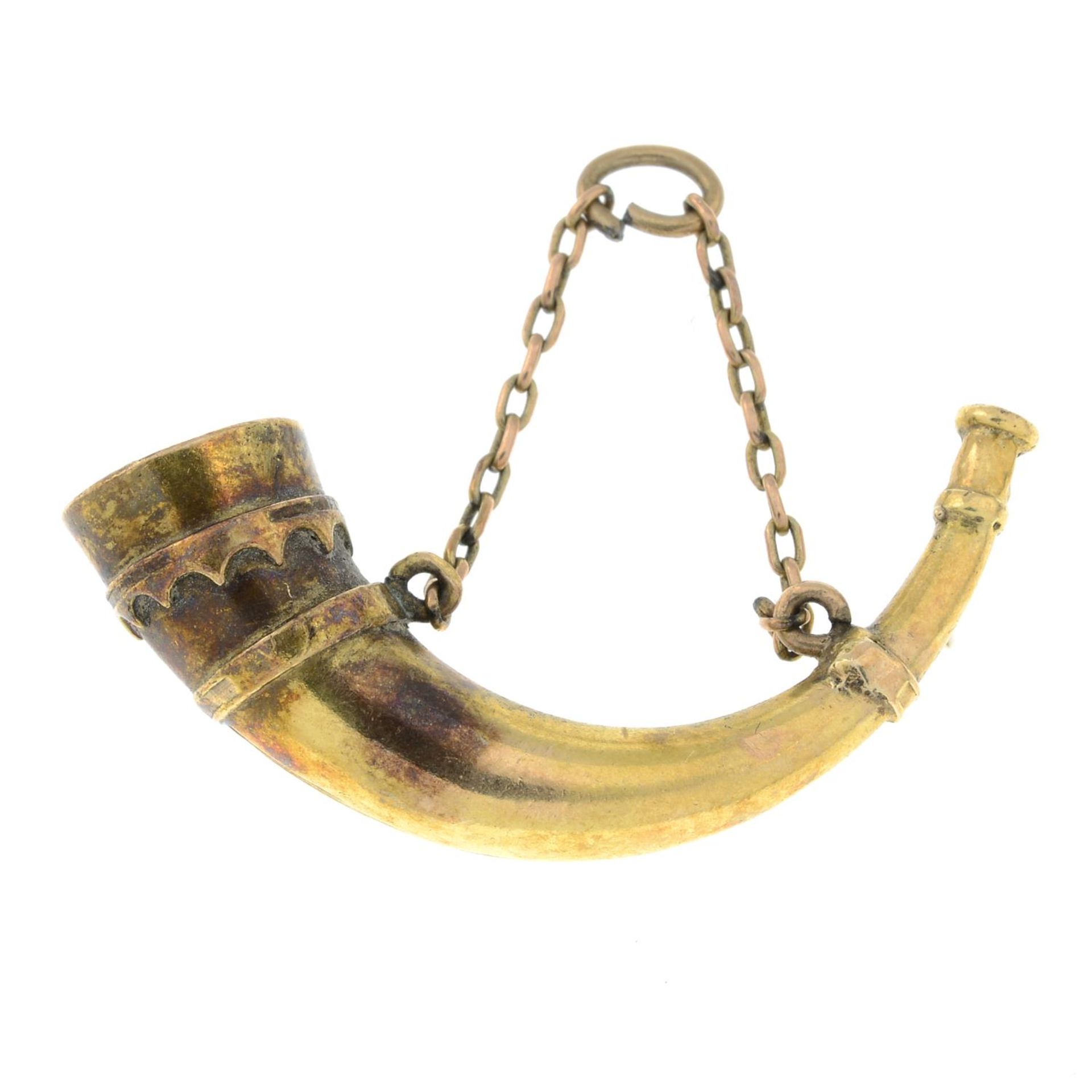 An early 20th century gold horn pendant.Length 3.1cms.