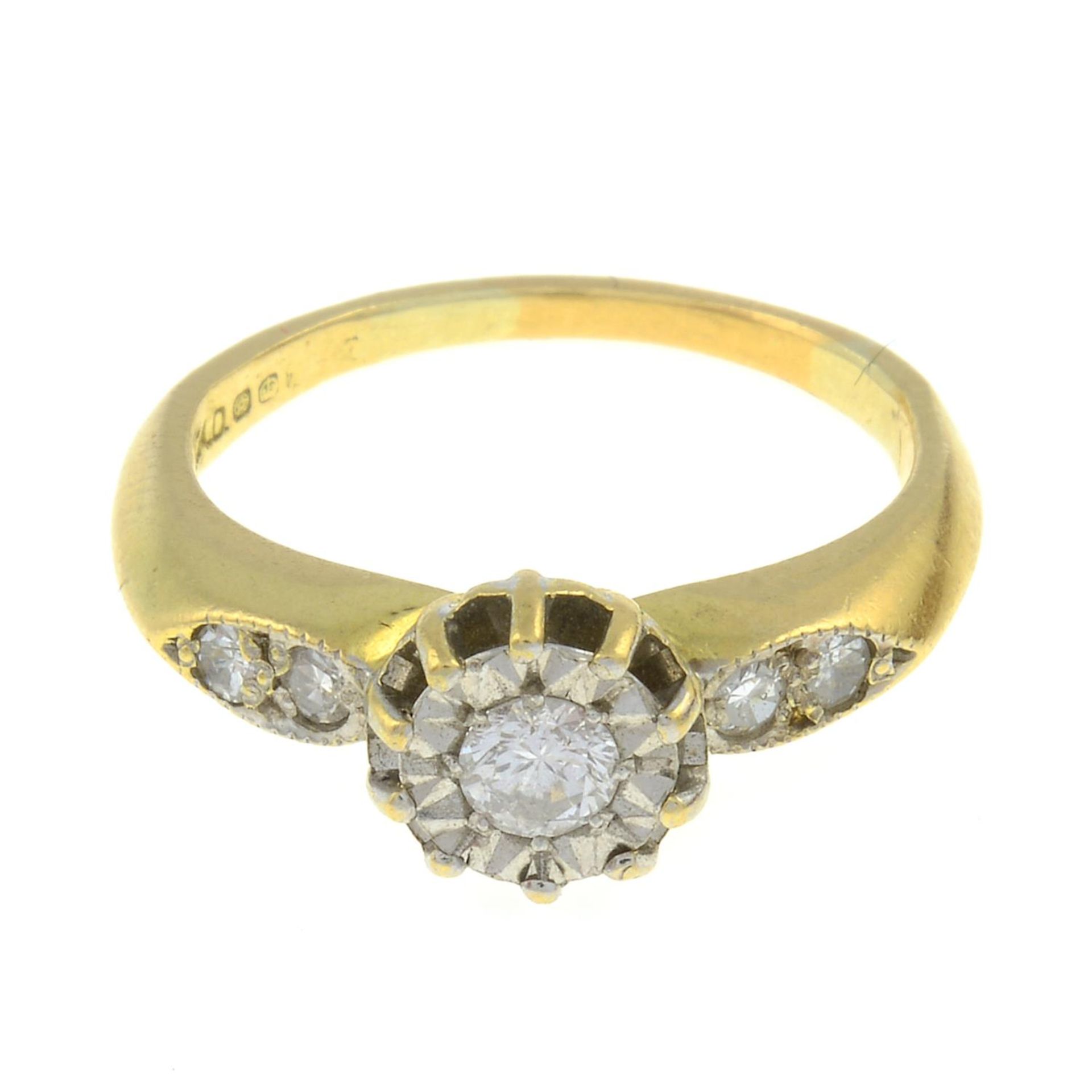 A gold illusion-set diamond dress ring.Estimated total diamond weight 0.20ct,