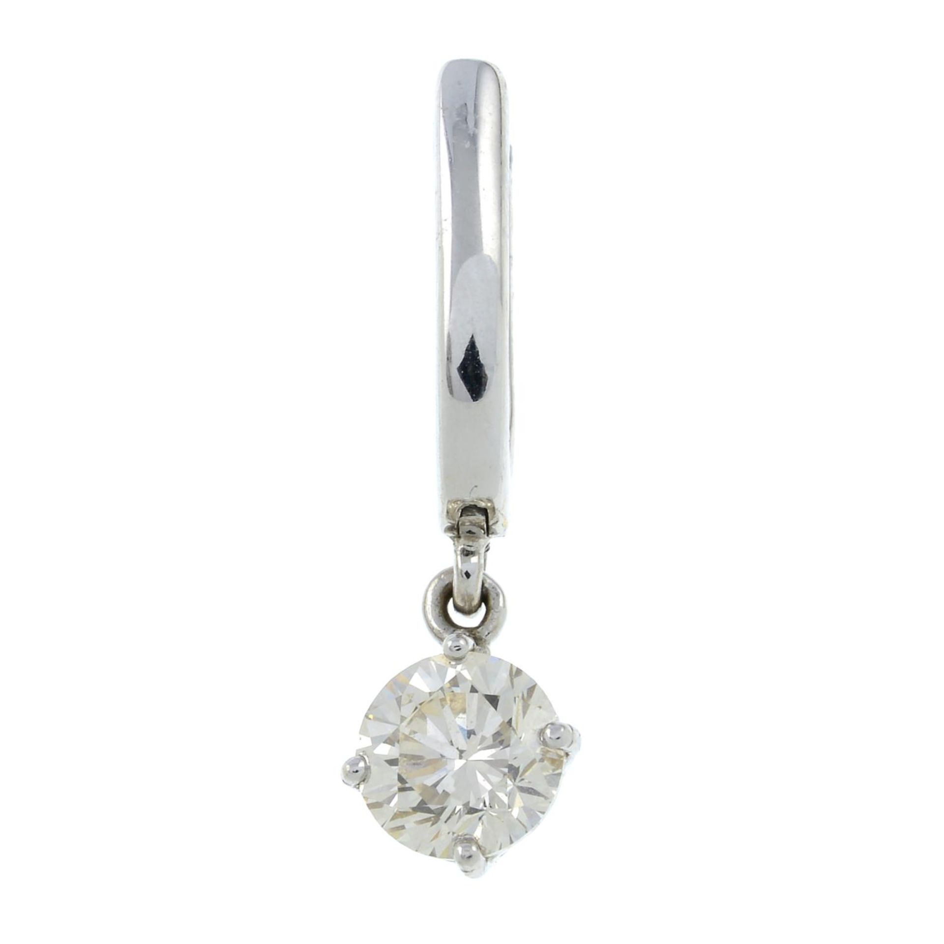 A brilliant-cut diamond single earring.Estimated diamond weight 0.90ct,