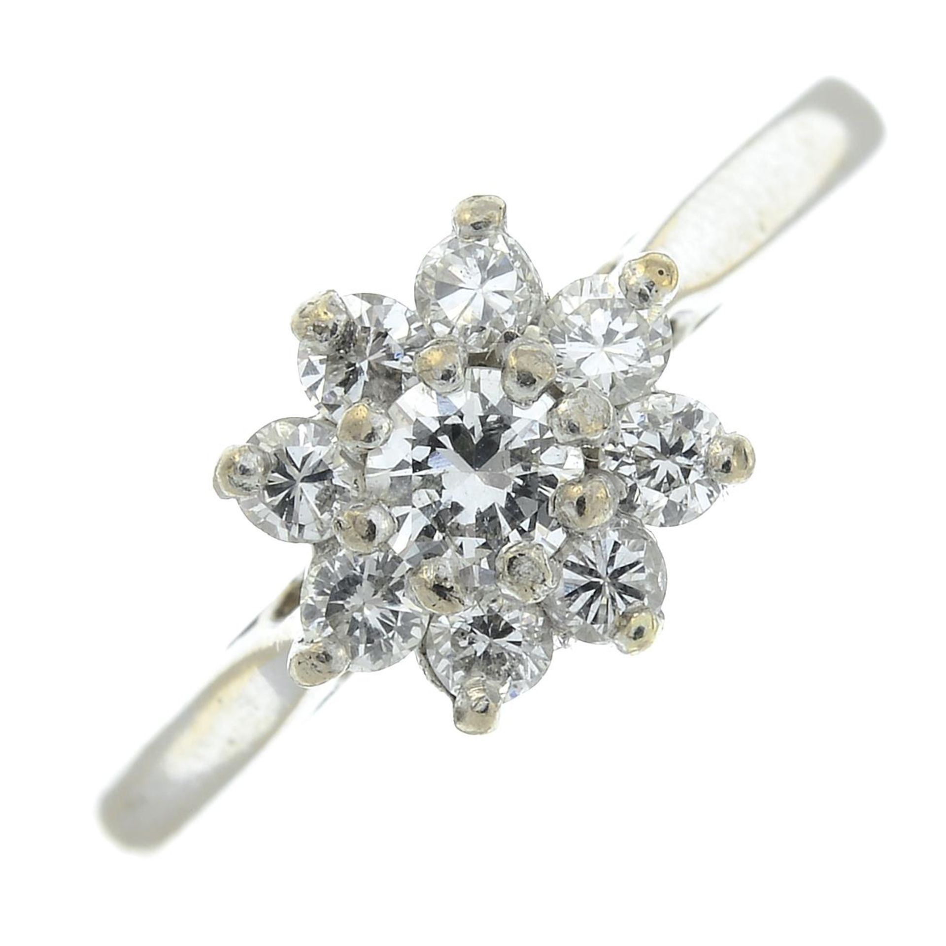 An 18ct gold brilliant-cut diamond cluster ring.Estimated total diamond weight 0.50ct,