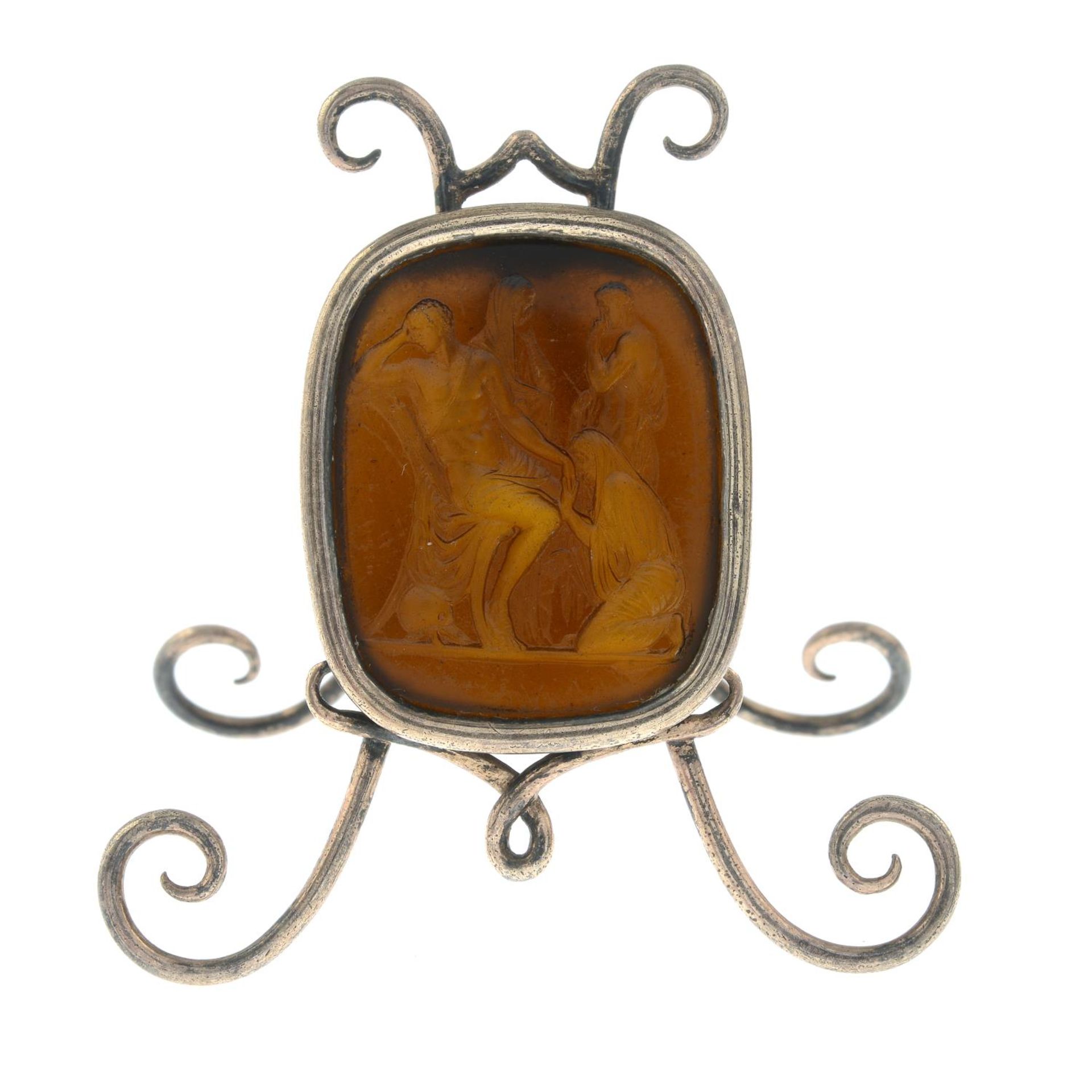 A 19th century frame, set with a paste intaglio, possibly depicting Jesus healing the blind.