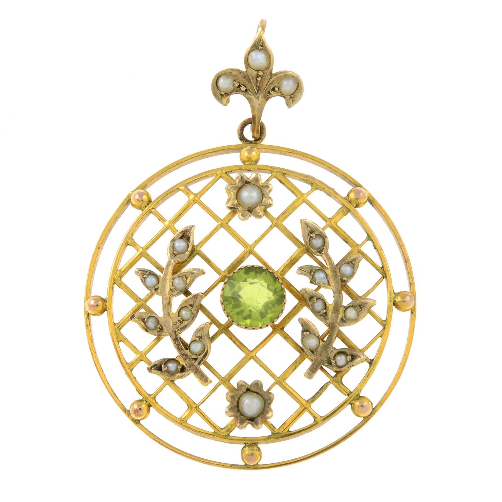 An early 20th century 9ct gold peridot and split pearl foliate pendant.Stamped 9ct.Length 4cms.