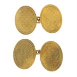 A pair of early 20th century 18ct gold textured cufflinks.