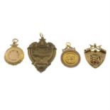 Four late Victorian to early 20th century 9ct gold medallion fobs.