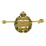 An early 20th century 15ct gold enamel Royal Tank Corps brooch.