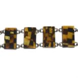 A reconstituted amber mosaic bracelet.