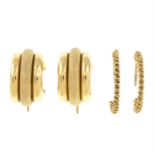 Two pairs of 9ct gold hoop earrings.