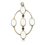 An early 20th century 9ct gold moonstone and ruby pendant.