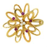 A 1970s 18ct gold ruby and diamond abstract brooch.