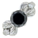 A 9ct gold diamond and black gem ring.