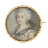 A mid 19th century 9ct gold portrait miniature brooch.