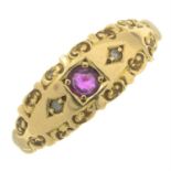 An early 20th century 18ct gold ruby and diamond three-stone ring.