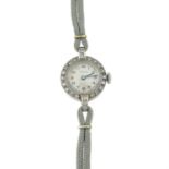 A lady's mid 20th century platinum and 9ct gold diamond cocktail wristwatch, by Vertex.