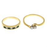 An 18ct gold diamond ring and an emerald and diamond half eternity ring.