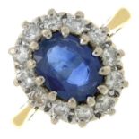 An 18ct gold sapphire and diamond cluster ring.