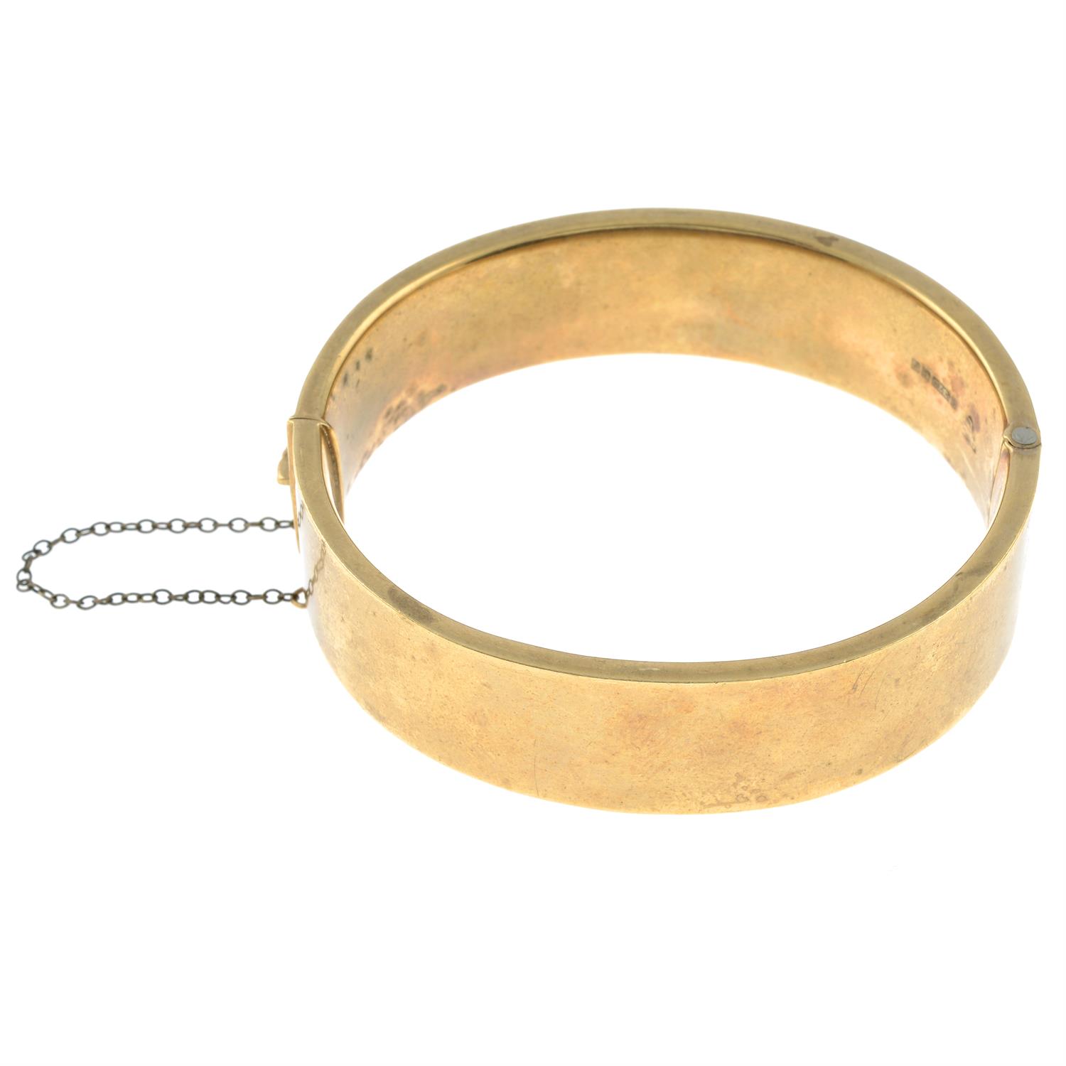 A 9ct gold engraved hinged bangle. - Image 3 of 3