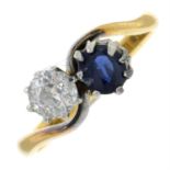 A sapphire and old-cut diamond crossover ring.