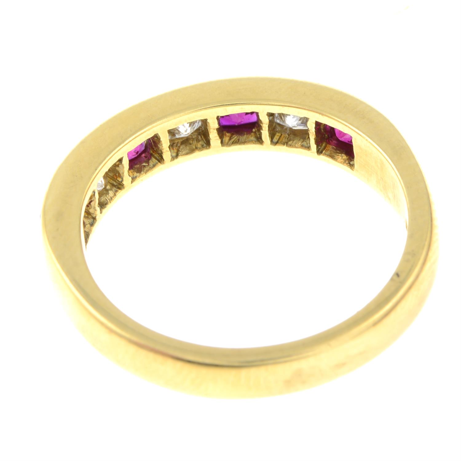 An 18ct gold ruby and diamond band ring. - Image 2 of 2