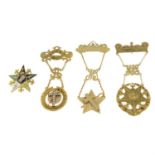 Four 9ct gold Masonic brooches.