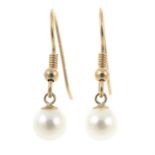 A pair of cultured pearl drop earrings.