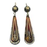 A pair of late 19th century tortoiseshell pique earrings.