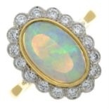 An 18ct gold opal and diamond cluster ring.