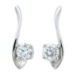 A pair of 18ct gold brilliant-cut diamond stud earrings.