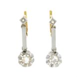 A pair of rose-cut diamond earrings.