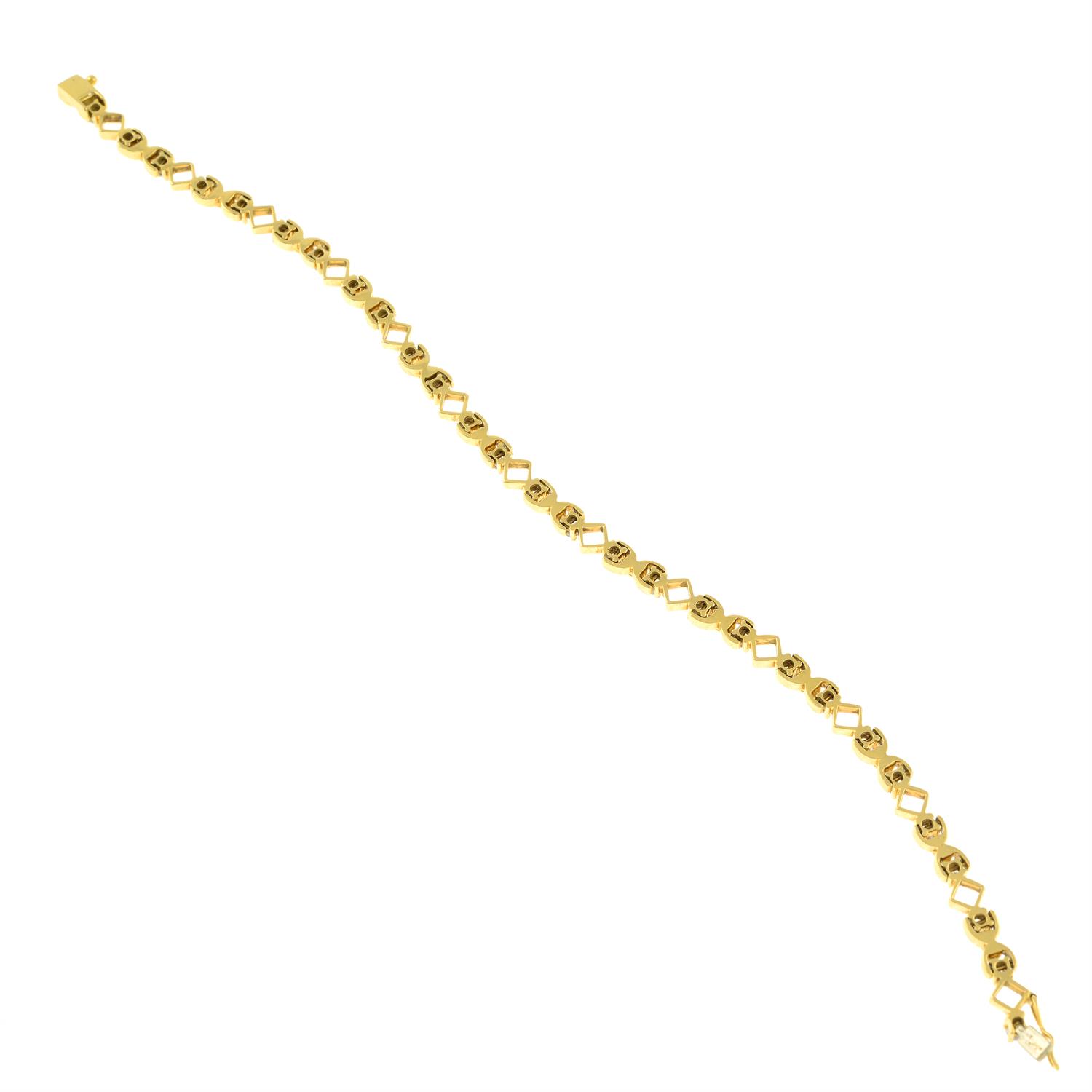 A diamond line bracelet with square-shape link spacers. - Image 2 of 2