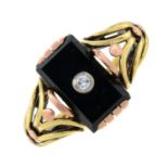 A mid 20th century diamond and onyx ring.