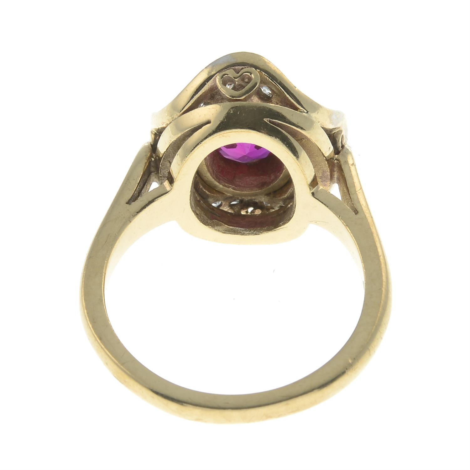 A synthetic ruby and cubic zirconia cluster ring. - Image 2 of 2