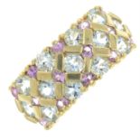 A 9ct gold aquamarine and pink sapphire lattice ring.