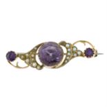 An early 20th century 9ct amethyst and pearl brooch. AF.