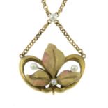 An Art Nouveau enamel and seed pearl necklace.