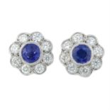 A pair of 18ct gold sapphire and diamond cluster earrings.