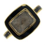 A late Georgian 18ct gold black enamel and woven hair mourning ring.