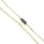 A graduated cultured pearl necklace, with marcasite-set clasp.