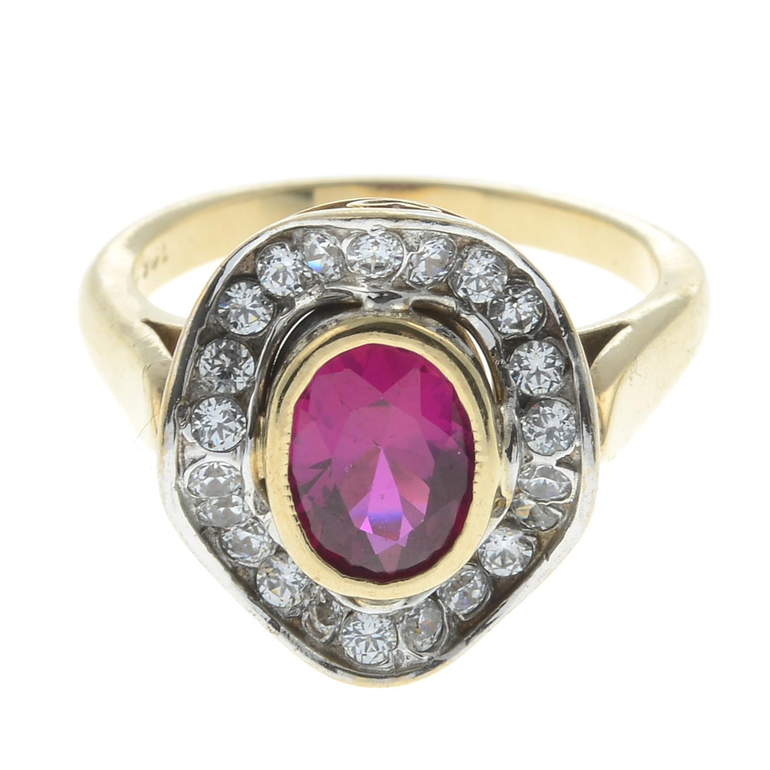 A synthetic ruby and cubic zirconia cluster ring.