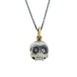 A silver enamel skull pendant with 18ct gold bail and rose-cut diamond eyes, with chain.
