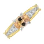 An 18ct gold topaz and brilliant-cut diamond dress ring.