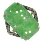 An early 20th century 9ct gold carved jadeite ring.