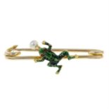An early 20th century gold enamel, ruby and seed pearl frog brooch.