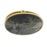 A Japanese mixed metal tie clip.