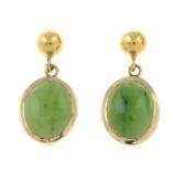 A pair of nephrite earrings.