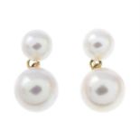 A pair of cultured pearl drop earrings.